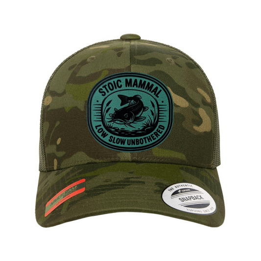 Stoic Mammal Low Slow Unbothered Catfish Camo Trucker Hat